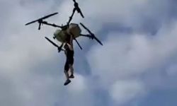 Drona tutunan çiftçi yere çakıldı