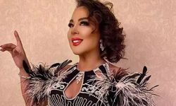 Safiye Soyman kapısına gelen domuzu elleriyle besledi