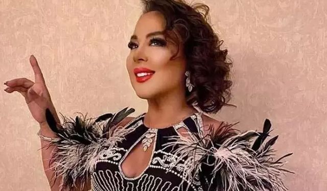 Safiye Soyman kapısına gelen domuzu elleriyle besledi