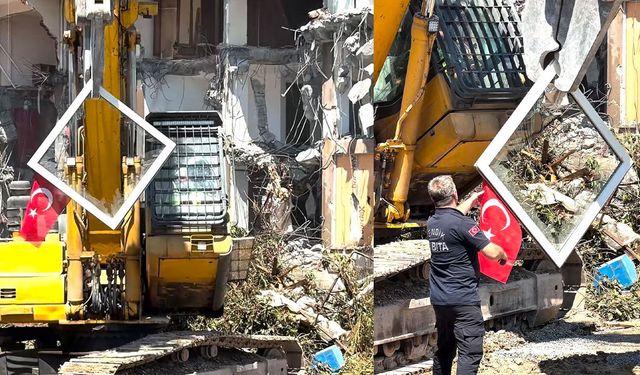 Yıkım sırasında Türk bayrağını fark edince kepçeyi durdurdu