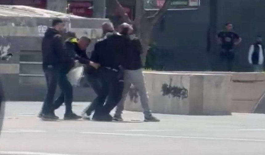 Kendini ihbar eden şüpheli etrafa ateş açtı