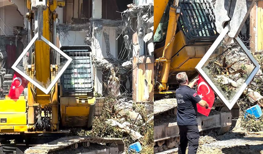 Yıkım sırasında Türk bayrağını fark edince kepçeyi durdurdu
